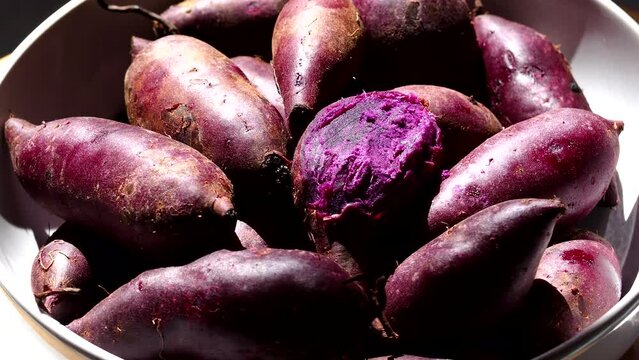Steamed sweet potatoes in bowl, in studio Chiangmai Thailand.
