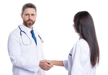 Fototapeta premium promotion deal in medicine. doctor handshake with nurse. healthcare insurance deal. medicine and healthcare. medical deal between two colleague isolated on white. Deal in progress
