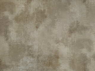 Gold or golden textured paint washed on a wall or panel, seamless texture, random texture. No...