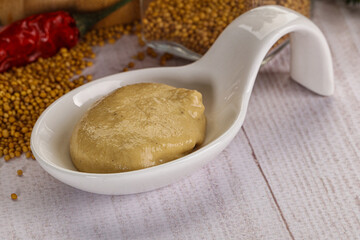 Dijon mustard sauce in the bowl