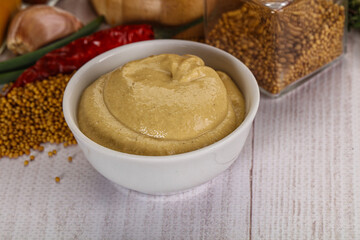 Dijon mustard sauce in the bowl