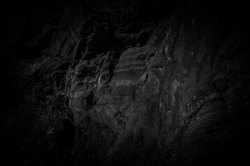 Black and white rock surface texture. Weathered stone background. - obrazy, fototapety, plakaty