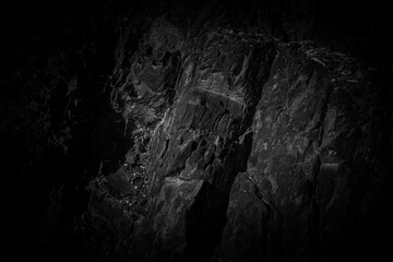 Black and white rock surface texture. Weathered stone background.