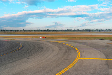 Turning onto the runway from the taxiway leaving for the takeoff at the airport.