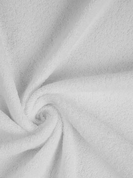 white terry towel. fragment of texture using the example of twisting