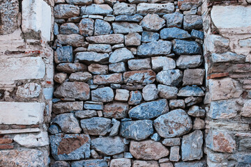 Close up shot of a beautifully textured dry stone wall 
