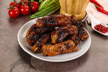 Grilled pork ribs in barbecue sauce