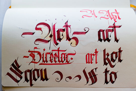 Gothic calligraphy writing with a broad pen ART director