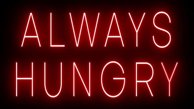 Flickering red retro style neon sign glowing against a black background for ALWAYS HUNGRY