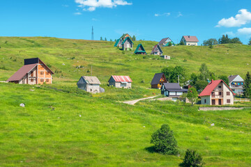 Sidehill houses in Zabljak. Durmitor, Montenegro - 715321690