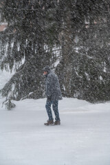 Person out walking in cold snowy winter weather