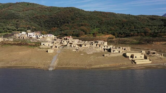 Sfentyli is an abandoned village which is sinking every winter when the dam of Aposelemi gets filled with water, Crete, Greece.