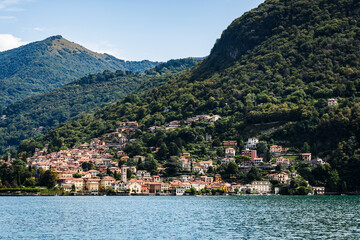 Fototapeta premium Italian mountain village at lake Como on a sunny summer day