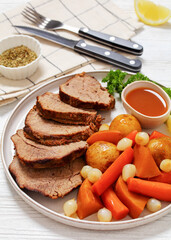 roast beef with dipping sauce and winter veggies