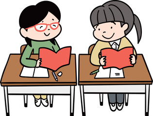 教室の机を並べた隣同士の小学生