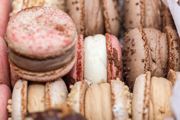 colorful traditional delicious french cookies macarons as background