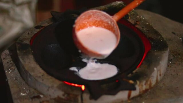 Making chitoi Pitha is one of the traditional food of Bangladesh. Bangladeshi Hand-Made Winter Pitha Cake-Making