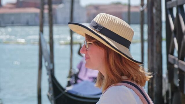 Attractive Beautiful Happy Caucasian Female Tourist Spending Vacation in Venice Italy during Hot Summer