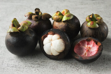 several mangosteens on the table