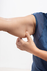The flabbiness and wrinkled of senior woman arm skin