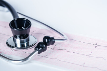 stethoscope and cardiogram close up