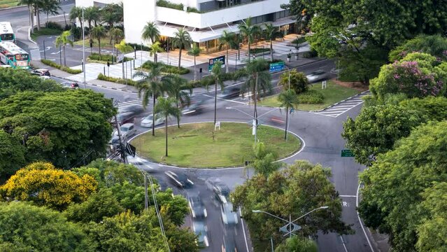 Day to night motion timelapse of traffic flow at roundabout, Osasco, Sao Paulo