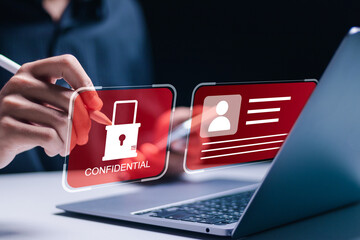 Employee confidentiality concept. Businessman use laptop to access documents data with padlock icon cyber security for managing corporate files and employee information.