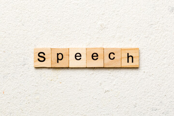 speech word written on wood block. speech text on cement table for your desing, concept