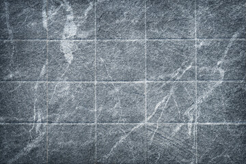 Background texture of textured square floor stone tiles