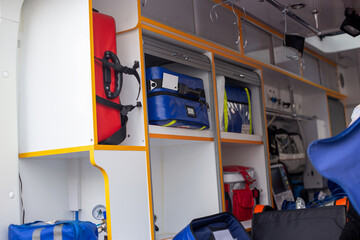 Inside of an ambulance showing medical supplies and storage compartments