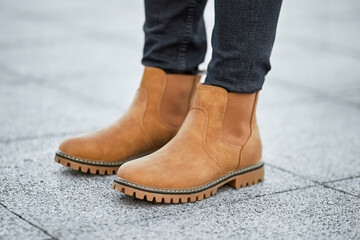 Suede winter shoes for men. Walking the City Streets in Comfort and Style with Modern Suede Leather Boots. Brown Boots.