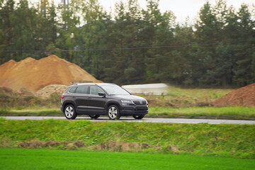 Fototapeta na wymiar A hybrid SUV car that combines power and elegance for family travel and business work isolated on a natural background.