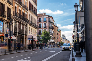Fototapeta na wymiar A populated street in Madrid, Spain. January 2024. Long exposure shot