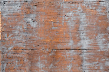 The background of the grunge wall, stucco rough surface. Bronze and gray. Background or texture for design