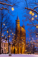 Maastricht, Netherlands 01-19-2024 Basilica of Our Lady and the square during twilight, covered...