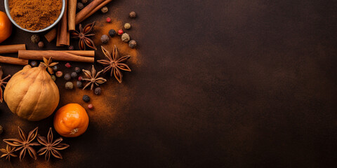 Fototapeta na wymiar Fall leaves and spices on black background, Background of mixed nuts. hazelnuts, walnuts, cedar