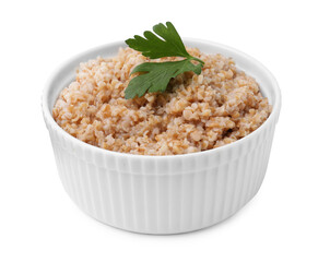 Tasty wheat porridge with parsley in bowl isolated on white