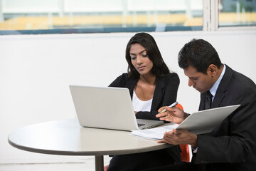 Indian business colleagues having a meeting.
