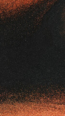 Color grain texture. Glitter dust. Defocused brown black color particles paint frame drip wave motion dark abstract art background.