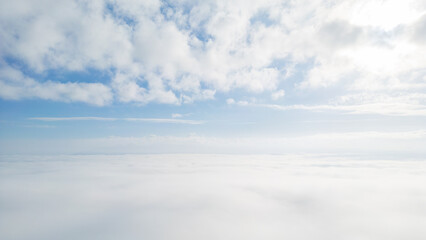 White clouds on blue sky background close up, cumulus clouds high in azure skies, beautiful aerial...