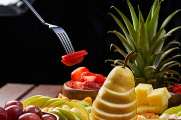 A plate of assorted natural fresh fruits