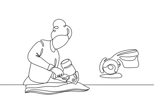 Seamstress. Cutting fabric. Rotary catter