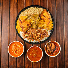 Mansaf al-Quzi with nuts and meat, rice with meat and nuts