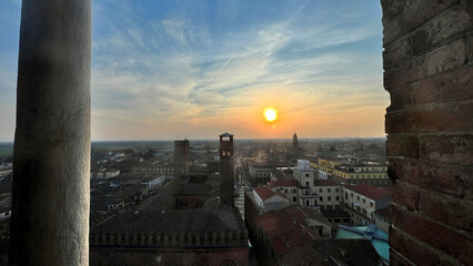 Cremona panorama of the cities seen from the Torrazzo tower at sunset