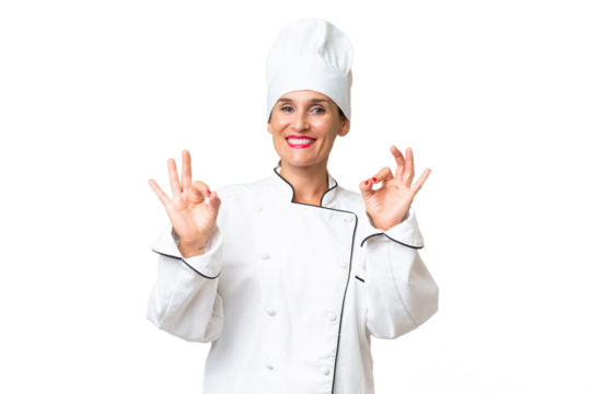 Middle-aged chef woman over isolated background showing an ok sign with fingers