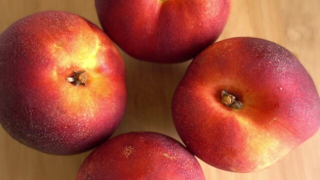 Freshly picked ripe peaches Rotating