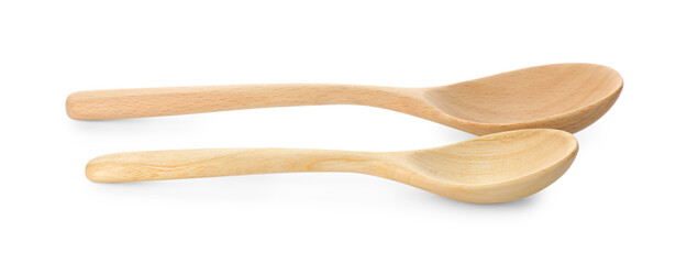 Two empty wooden spoons isolated on white
