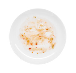 Dirty plate with smeared sauce on white background, top view