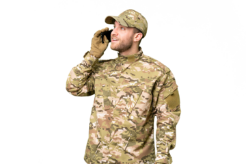Military man over isolated chroma key background keeping a conversation with the mobile phone