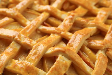 Tasty homemade quince pie as background, closeup